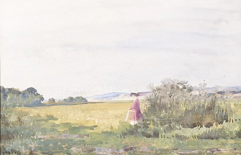 Donna in cappotto rosa in campagna
